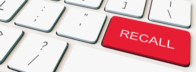 photo of keyboard with red RECALL button