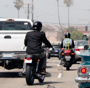motorcycles lane splitting on a highway